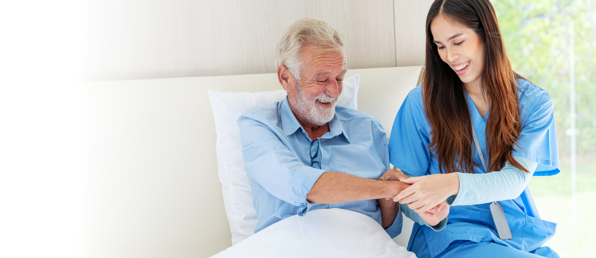 healthcare worker assisting elderly man