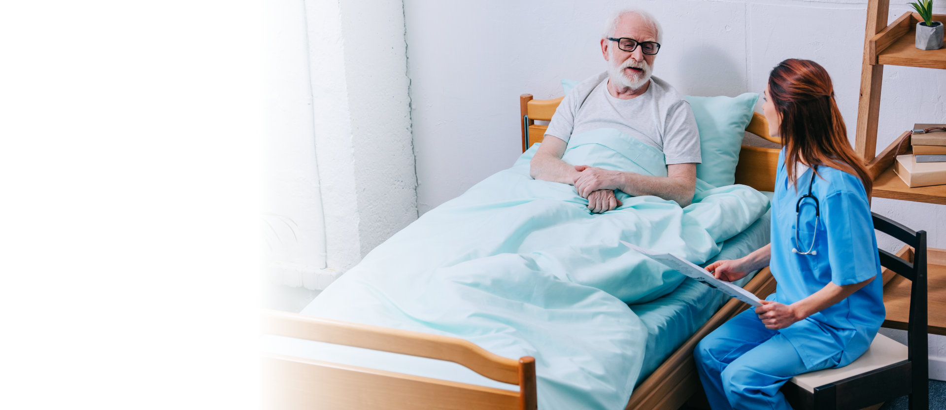 nurse comforting senior