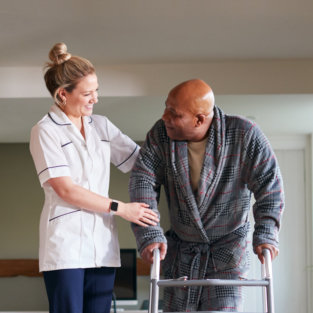 nurse helping senior