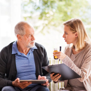 nurse talking to senior